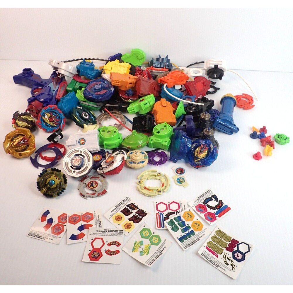 Beyblade Bulk Lot with Launchers, Parts and Sticker Sheets Random Lot